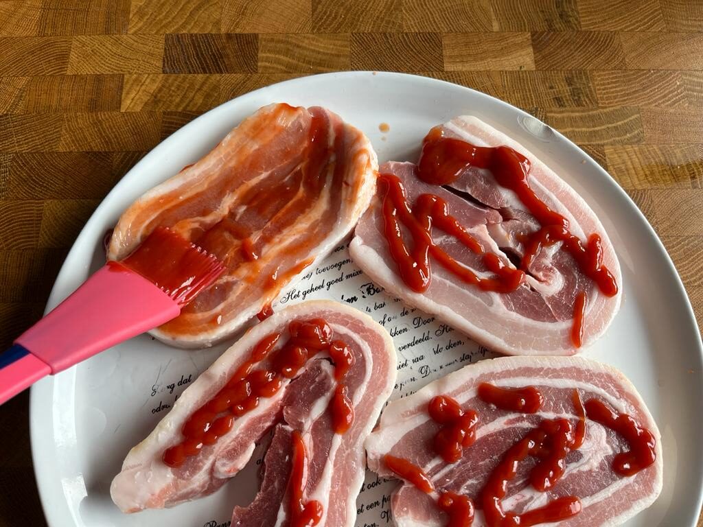 Hamburger/Speklap gepaneerd met Ketchup